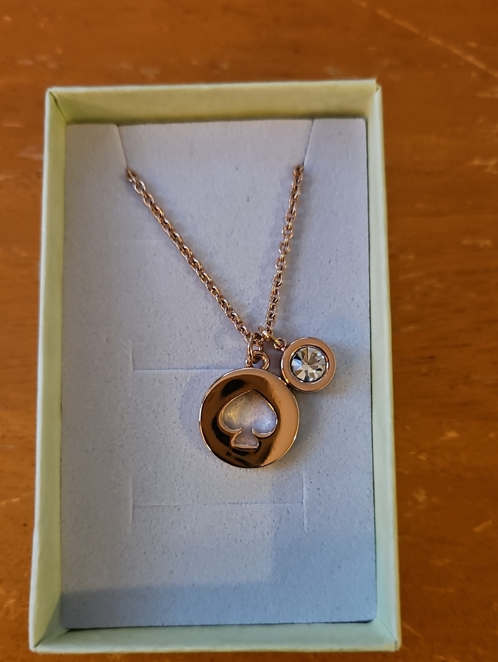 Kate Spade "Spot The Spade" charm necklace